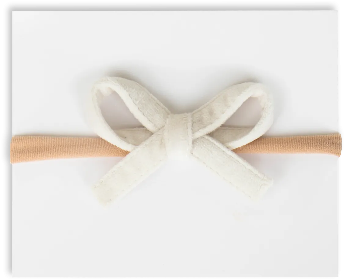 Mini velvet bow headbands by Adora